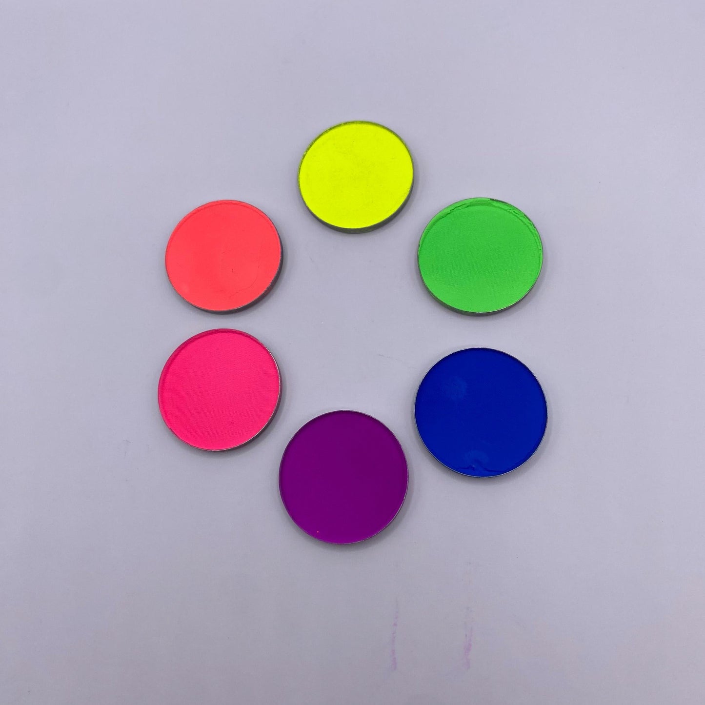 Neon matte pressed pigments