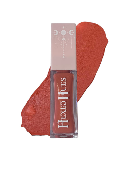 hexed hue blush bottle with color swatch behind it on a white background
