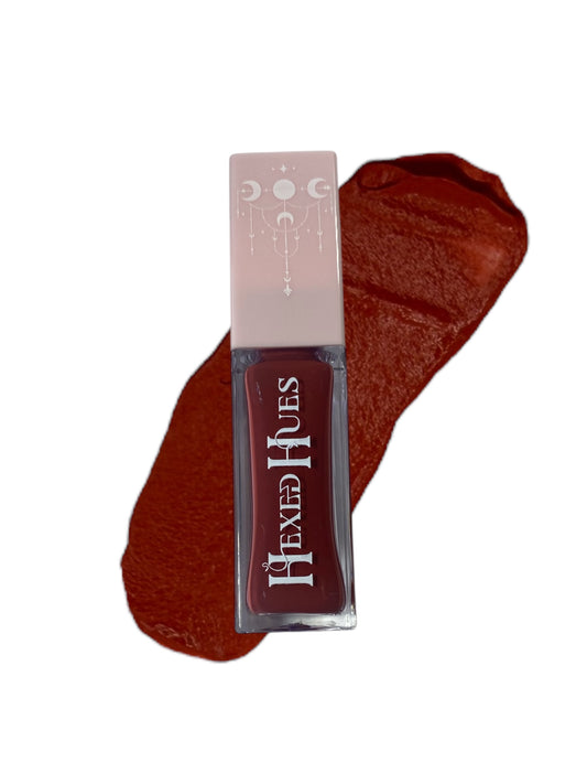 Blush tube with Hexed hues  printed on it, showing the red color swatched